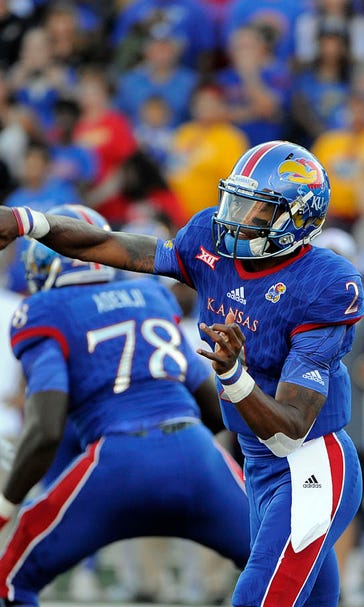 Kansas picks up first win in 665 days with 55-6 rout of Rhode Island